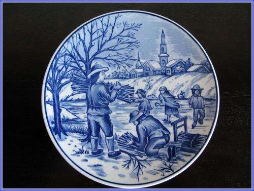 A Delft wall plate in mint condition. 18.5cm diameter. In mint condition.