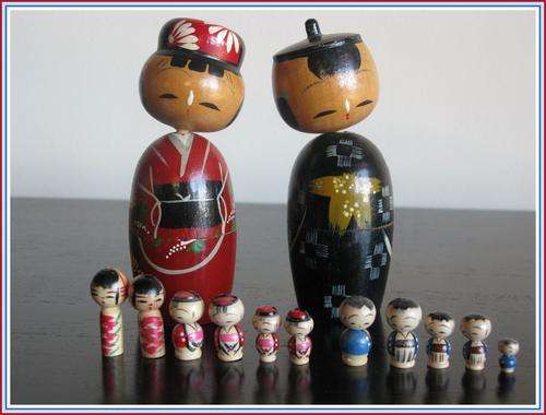 Two Kokeshi dolls, nodding and nesting. Height 12cm. VINTAGE