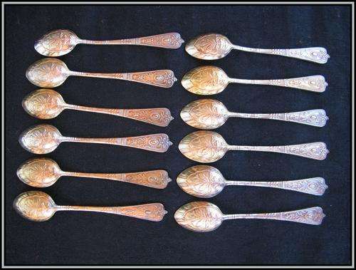 Set of 12 antique tea spoons NS - Nickel Silver with golden sheen.