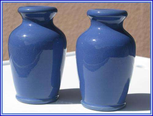 Set of two ceramic blue vases.