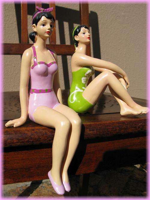 Two girlie figurines - shelf decoration.