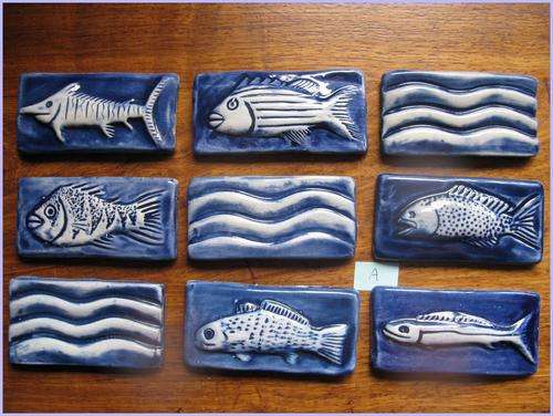 9 Decorative ceramic fish tiles by artist J. Newdigate. Set A