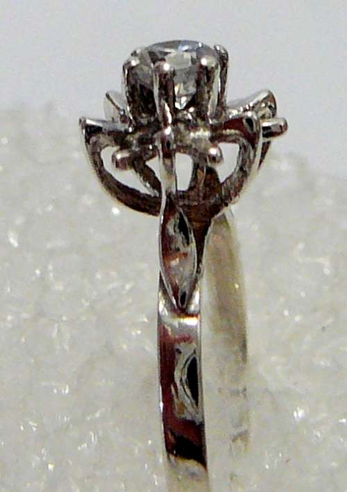 Sterling Silver Ring set with a CZ in a Flower Shaped Setting