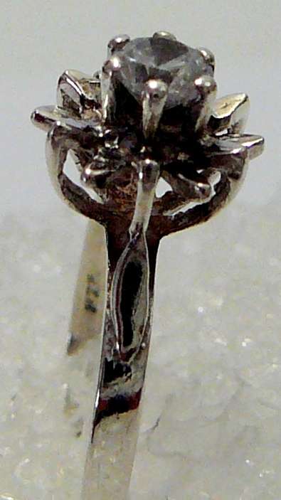 Sterling Silver Ring set with a CZ in a Flower Shaped Setting