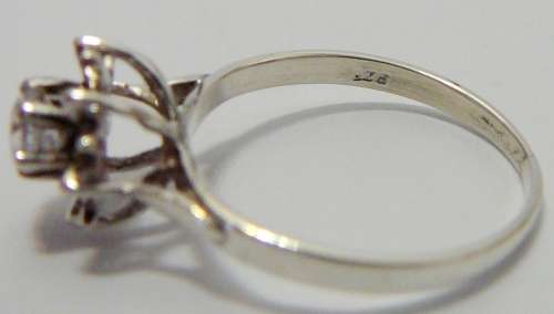Sterling Silver Ring set with a CZ in a Flower Shaped Setting