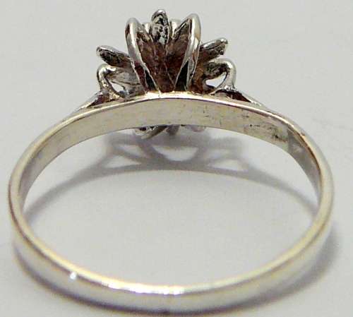 Sterling Silver Ring set with a CZ in a Flower Shaped Setting