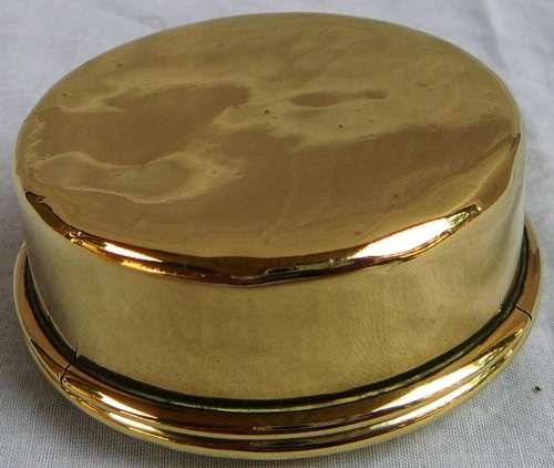An Antique Brass Tin with The Coat of Arms of Wales