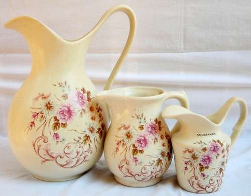A Bedroom Wash Basin and Three Jugs by Crescent Potteries