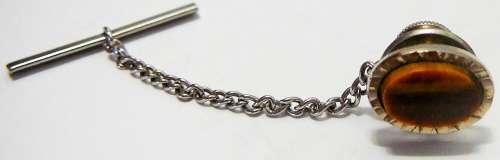 A Tigers Eye Tie Pin with Chain