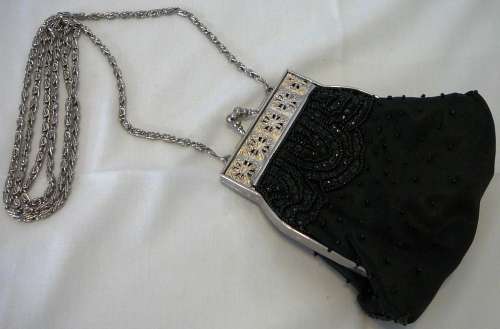 A Very Smart Black Beaded Evening Bag on Long Silver Coloured Chain