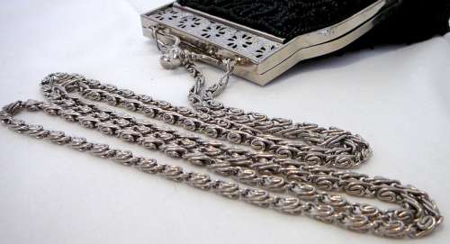 A Very Smart Black Beaded Evening Bag on Long Silver Coloured Chain