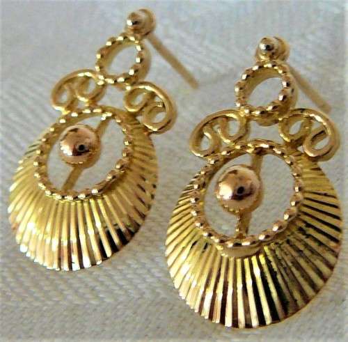 An Elaborate Pair of Hand Crafted 9ct Yellow Gold Earrings
