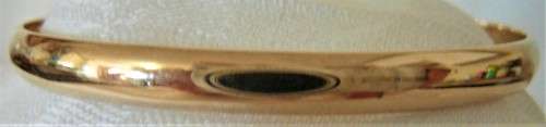 A Solid 9ct Yellow Gold Bangle