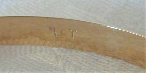 A Solid 9ct Yellow Gold Bangle
