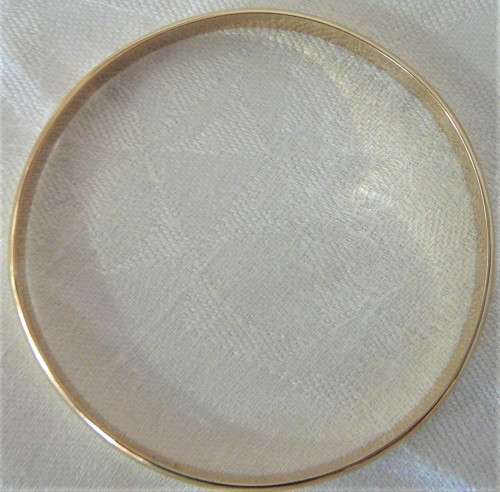 A Solid 9ct Yellow Gold Bangle