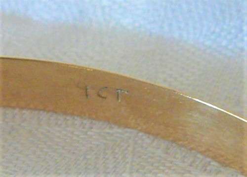 A Solid 9ct Yellow Gold Bangle