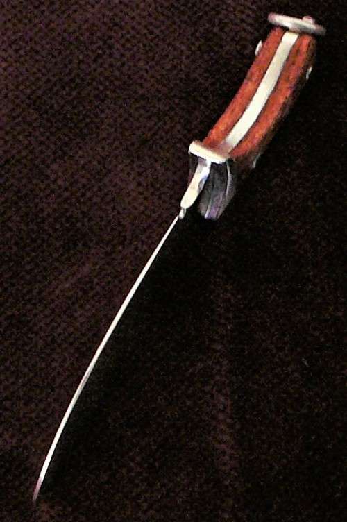 A Stunning Sterling Silver Miniature Knife with Rosewood Handle Pendant