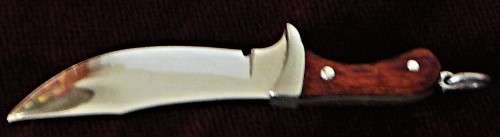 A Stunning Sterling Silver Miniature Knife with Rosewood Handle Pendant