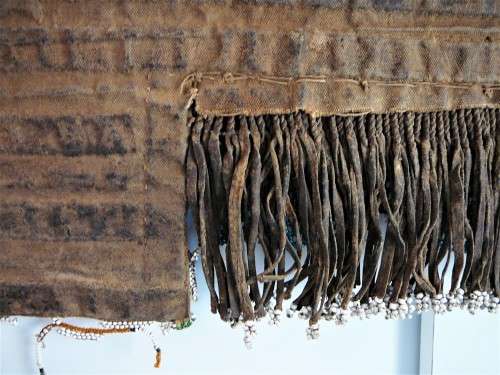 A Hand Made Glass Bead and Leather African Wall Hanging