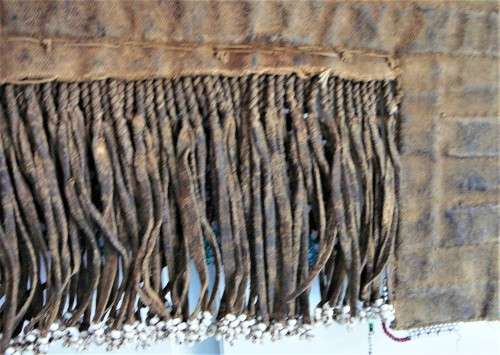 A Hand Made Glass Bead and Leather African Wall Hanging