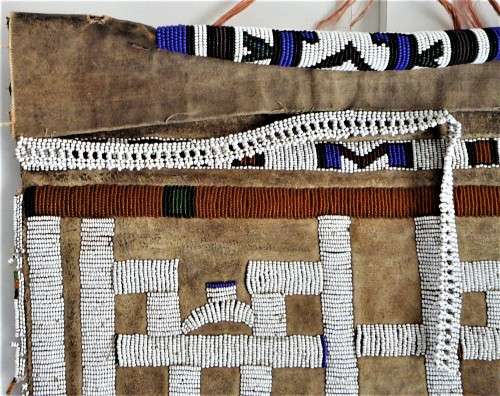 A Hand Made Glass Bead and Leather African Wall Hanging