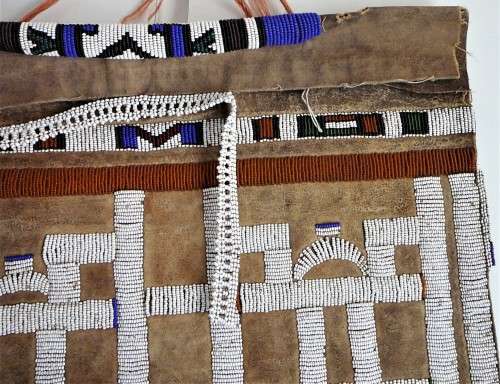 A Hand Made Glass Bead and Leather African Wall Hanging