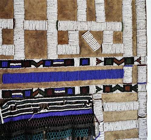 A Hand Made Glass Bead and Leather African Wall Hanging