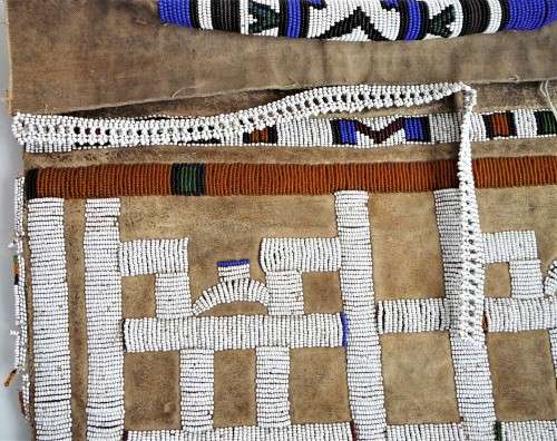 A Hand Made Glass Bead and Leather African Wall Hanging