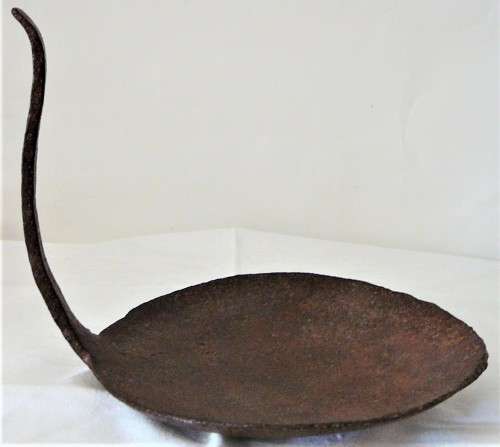 A Very Interesting Hand Beaten African Iron Lamp with Handle