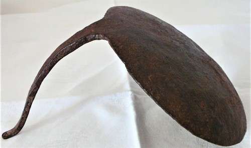 A Very Interesting Hand Beaten African Iron Lamp with Handle