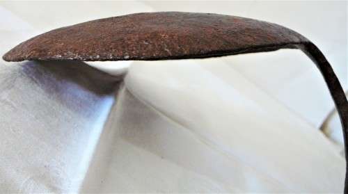 A Very Interesting Hand Beaten African Iron Lamp with Handle