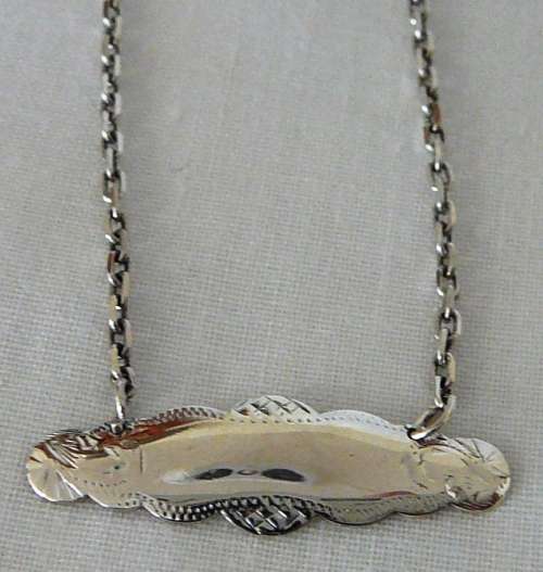A Fine Sterling Silver Necklace Chain with a Name Tag