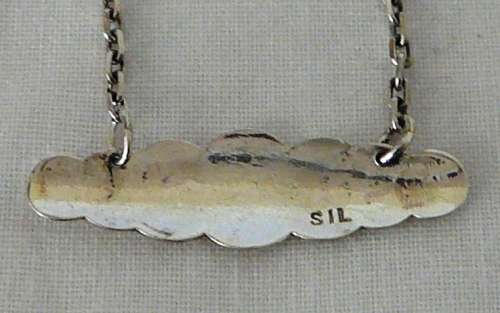 A Fine Sterling Silver Necklace Chain with a Name Tag