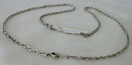 A Fine Sterling Silver Necklace Chain with a Name Tag