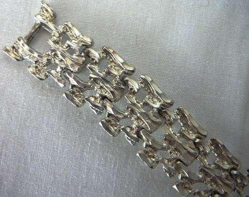 A Silver Coloured Braclet by TKB1