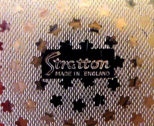 An Unused Convertible Powder Compact by Stratton