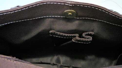 A Stylish Dark Brown Leather Handbag by Joshua Taylor