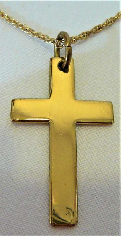 A Gold Coloured Cross on a Chain