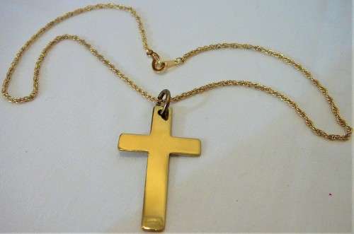 A Gold Coloured Cross on a Chain