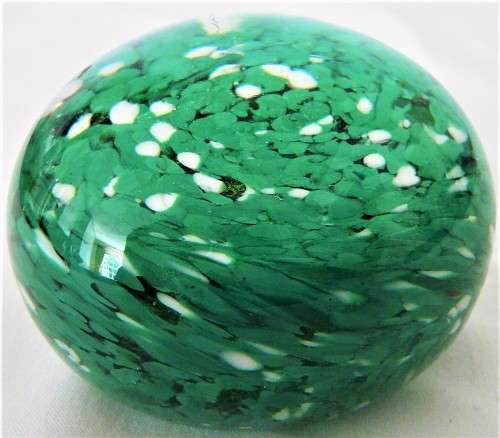 A Very Pretty Glass  Paperweight full of  Green and White Dots