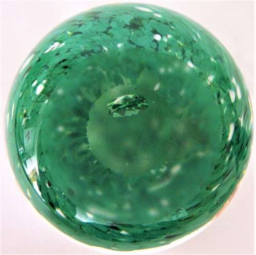 A Very Pretty Glass  Paperweight full of  Green and White Dots