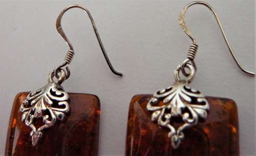 A Charmin Pair of Amber Earrings set in Sterling Silver