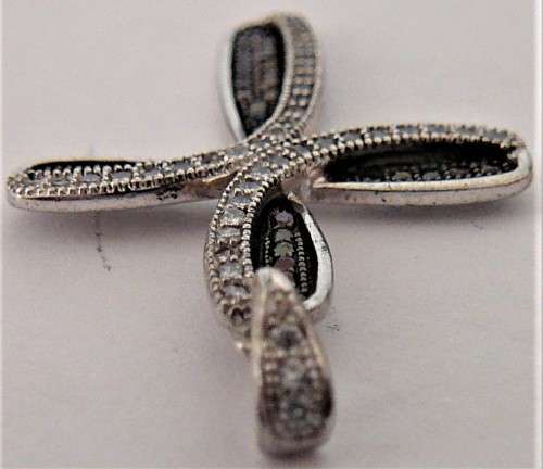 A Very attractive Sterling Silver Cross set with Black and White CZ's