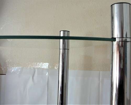 A Three Shelf Glass and Chrome Corner Unit