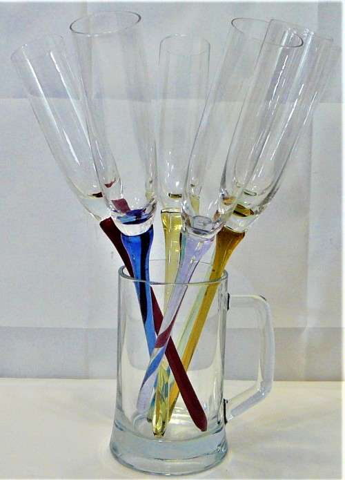 A Set of 6 Baseless Champagne Flutes Specially Made for the Beach