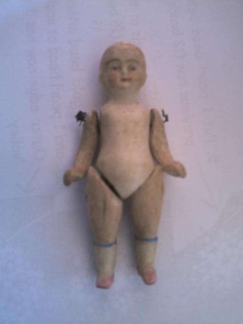 Antique China Doll 72mm tall. Make unknown.