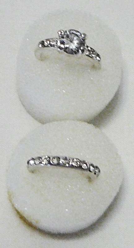 A Pair of Silver Coloured Rings set with Diamantes