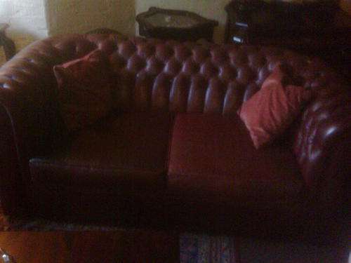 RED LEATHER COUCHES