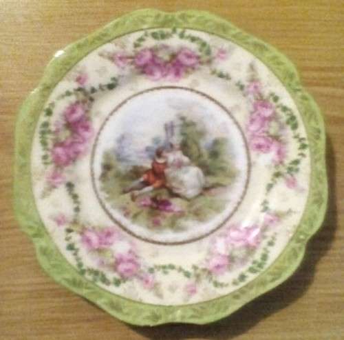 Continental china plate, courting couple. Small chip to edge. Can combine postage on small items. 1.