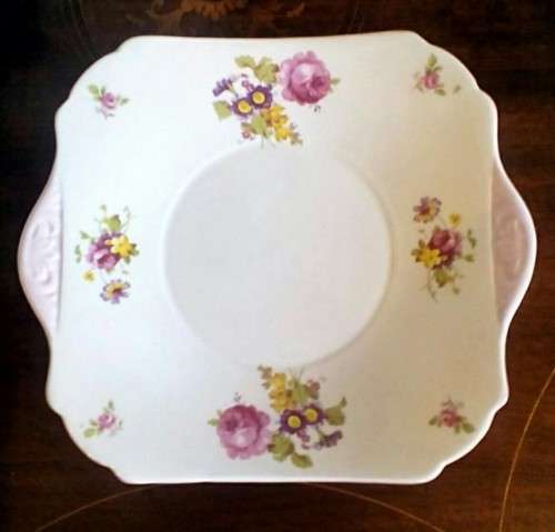 Beautiful fine  porcelain large cake plate  by Shelley. Pretty pink edged floral design.